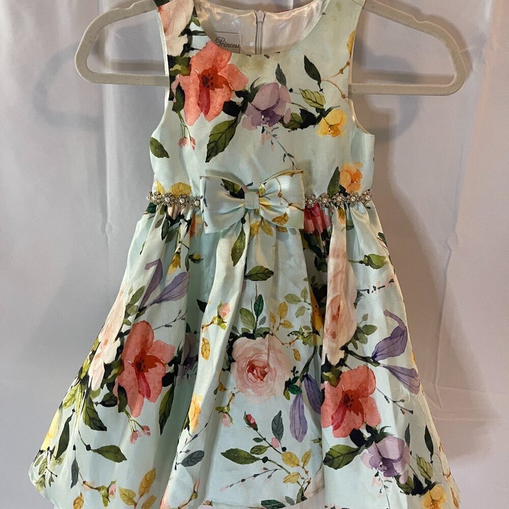 COUTURE PRINCESS. SIZE 6 IN LONG PRINCESS-CUT FLOWERED POLYESTER.